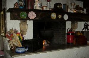 A shelf of memorabilia near the dining area