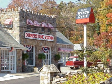 Stone building and antique car outside Rock City