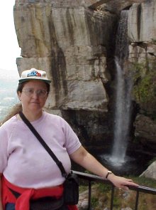 Linda with waterfall behind her