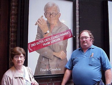 Mom and James in front of the poster